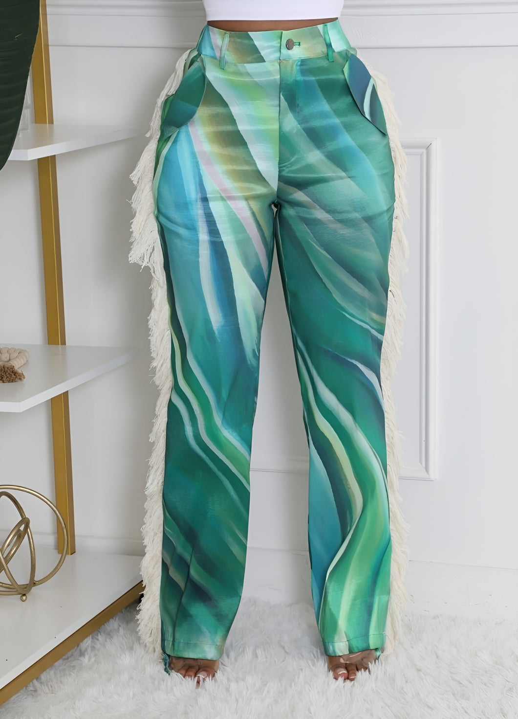 Bring all the drama to your weekend with these Ms. Miami swirl pants. Featuring a relaxing fit designed to cinch the waist while loosely hang on the legs for an hourglass silhouette, and unique twill tassel side detailing, how can you not be obsessed? Style these swirl pants with a statement top, heels and designer sunglasses for a look that will really make you stand out from the crowd.