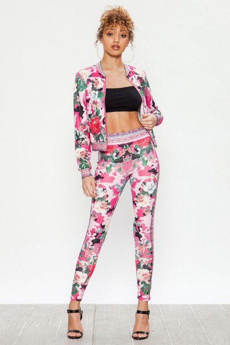 We're bringing you the ultimate Flowers and Camo tracksuit! Perfect for building your favorite looks all year round. This tracksuit is luxurious, has excellent stretch, and extremely comfortable. The jacket is long sleeve, soft stretch fit, with a front zipper. The bottoms are stretchy waistband and hugs you in all the right places. Pair with transparent heels, gold jewelry to create a cute and casual look. 