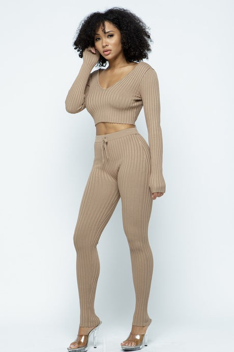 This Just Chill Set is every wardrobe essential. Featuring a nude rib kitted fabric with a V neckline top with long sleeves, high rise pants with soft elasticized waistband, lightweight material. Style with a high heel or boots and handbag for a weekend look you'll love! 